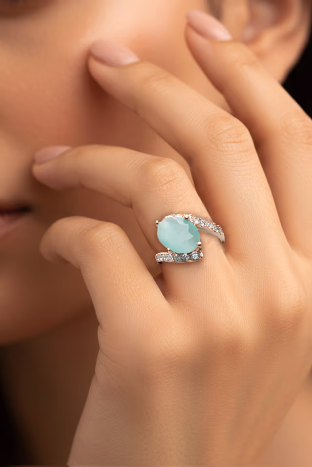 Aqua Green Oval Stone Twisted Band Ring — rent in Kochi