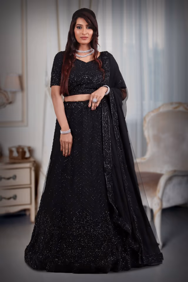 Black cutbead work lehenga — back view, rent in Calicut