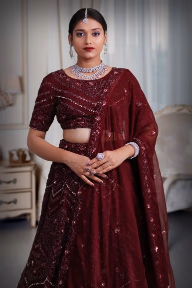 Wine zarkan & beads work lehenga — rent in Coimbatore
