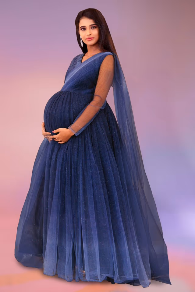 Double shade blue colour gathered gown — back view, rent in Calicut