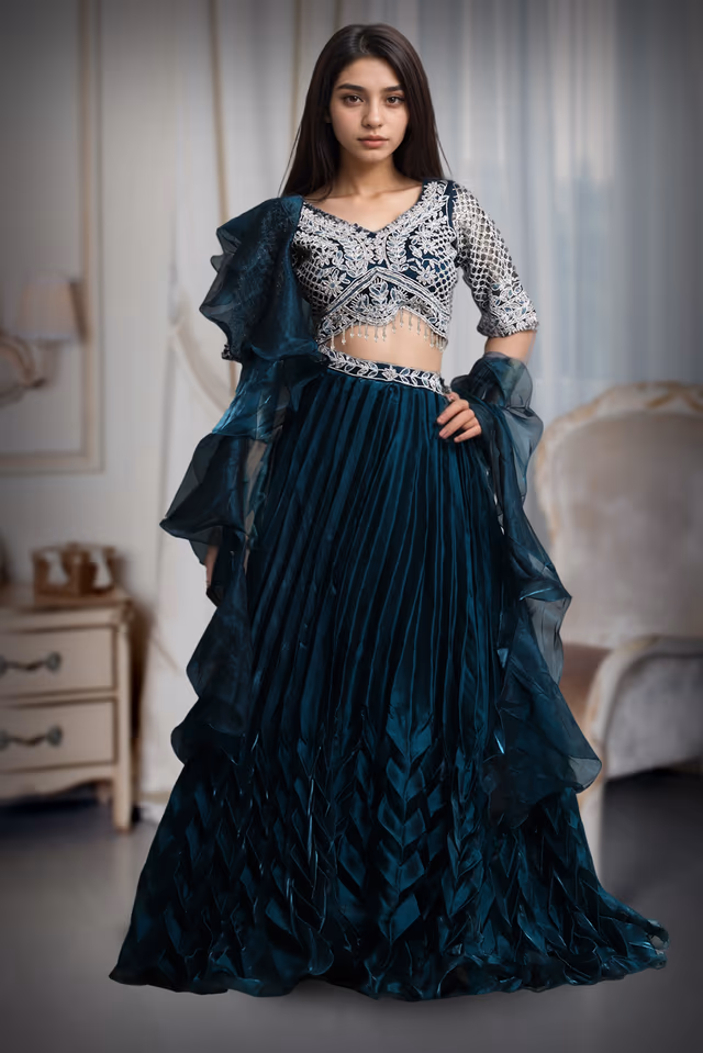 Dark Teal Blue Frilled Pre Wedding Lehenga With Stone Work Detailed Crop Top And Frilled Dupatta — back view, rent in Kochi