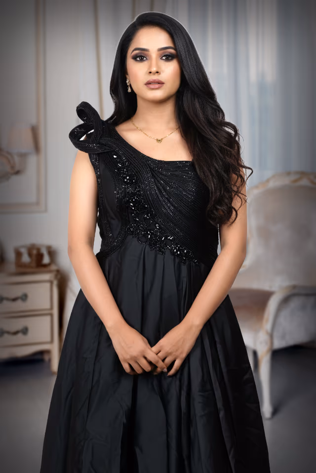 Black Gown Features Stone Details, Creating A Graceful And Luxurious Appearance — view 1 of 4
