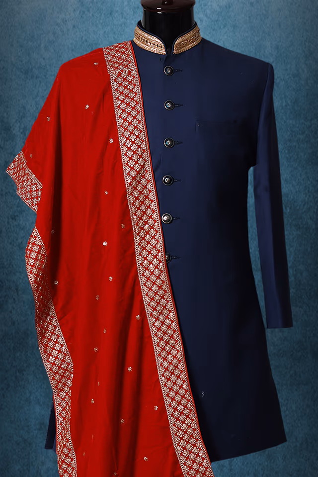 Saffron Red Elegant Grooms Sherwani With Golden Border Details — back view, rent in Coimbatore