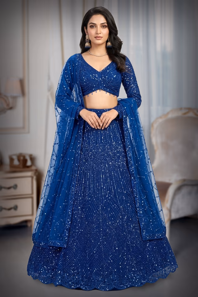 Exquisite Royal Blue Lehenga Set Featuring Shimmering All-Over Sequins, Matching Choli, And A… — back view, rent in Calicut