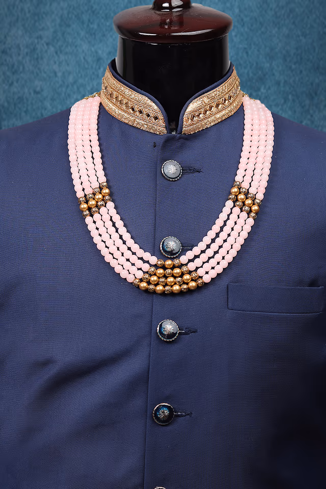 Baby Pink Mothi Mala With Golden Beads And White Stone Side Rings With A Triangle Structural Pattern… — rent in Coimbatore