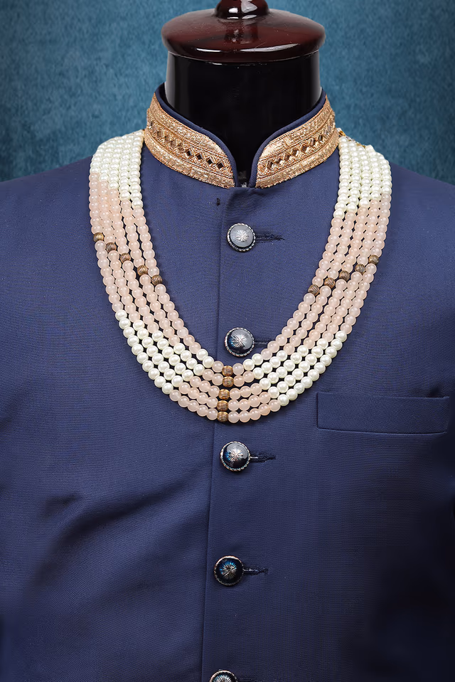 Pastel Peach And White Five Layered Mothi Mala With Golden Stone Strings On Sides And Center Front — rent in Coimbatore