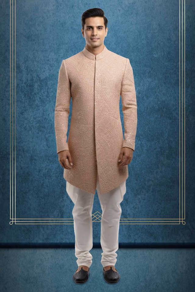 Oyster Pink Grooms Sherwani With Elegant Threadwork Details Along With Stone Embellished Buttons — rent in Calicut