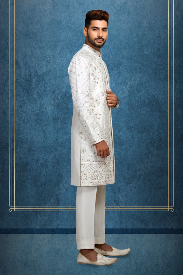 White Grooms Sherwani With Heavy Threadwork Details Along With Same Color Pant — back view, rent in Calicut