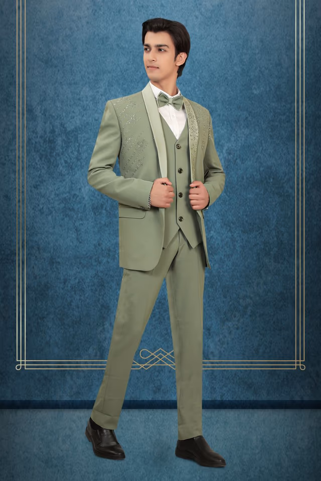 Elegant Sage Green Color And its Regal, Formal Styling With The Embroidered Lapel Suit — back view, rent in Kochi