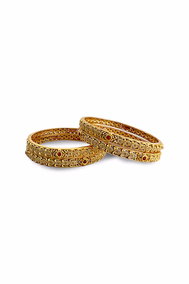 Experience Royal Elegance Wearing These Ornate Traditional Indian Bangles With Sparkling Ruby Pink… — rent in Bangalore