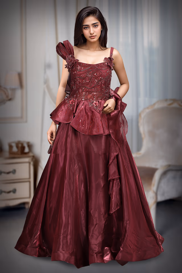 Dark Maroon Tissue  Silk Gown With Handwork Embellishment And Pleats From Yoke Details — rent in Kochi