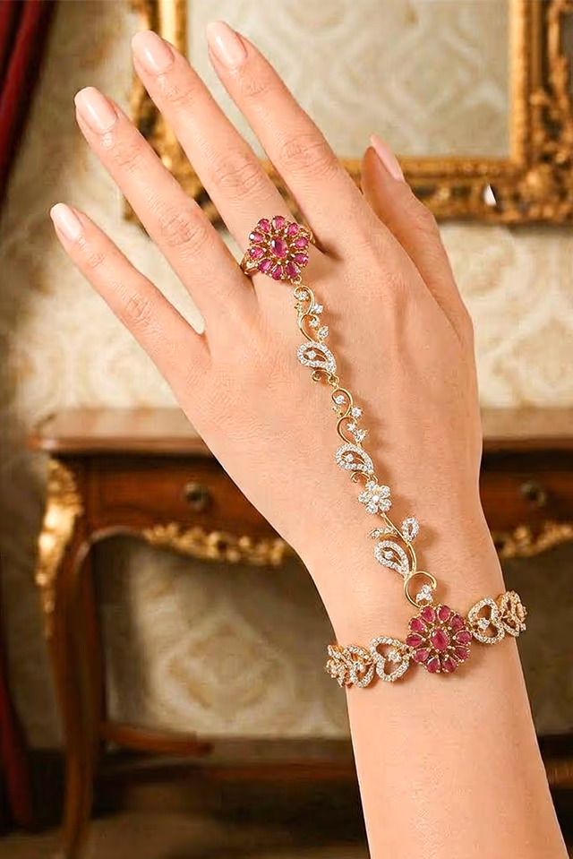 Elegant Ruby Pink AD Stone Ring Bracelet With Intricate Tear Drop Pattern Stone Embellishment — rent in Calicut