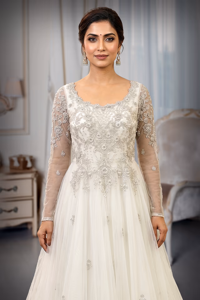 Ethereal Ivory Tulle Gown with Silver Beadwork and Cathedral Trail — rent in Edappally
