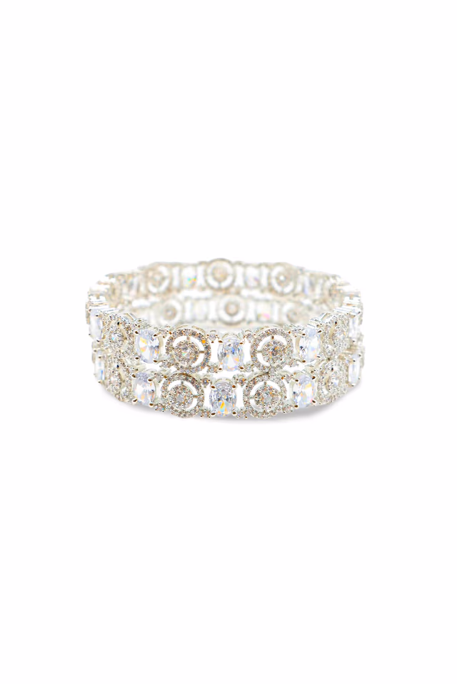 Exquisite Silver Bangles Embellished With Sparkling Clear Radiant Oval Stones — rent in Calicut