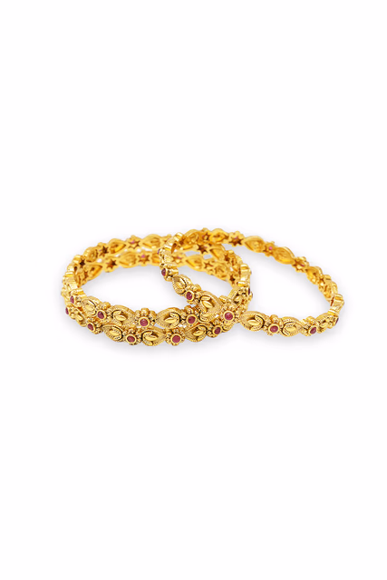 The Bangles Have A Distinct Vintage Charm, Set With Four Rectangular Emerald-Green Stones And Four Red… — rent in Coimbatore