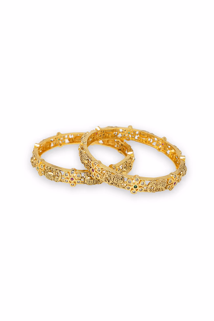 Golden Bangle Showcases Incredible Detail And Timeless Elegance — rent in Coimbatore