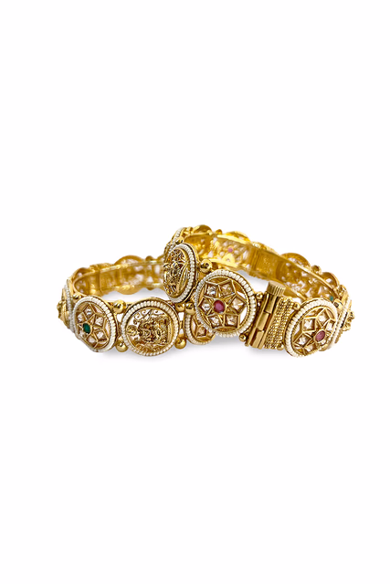 Traditional Indian Golden Bangles Feature Intricate Moti Work And A Rich Antique Finish — rent in Bangalore