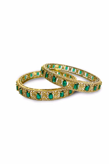 Embrace the opulence of Indian craftsmanship with these magnificent Green And Golden Bangles — rent in Bangalore
