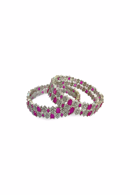Feel Like Royalty Wearing These Exquisite Silver Toned Bangles Featuring Lustrous Majentha And White… — rent in Bangalore
