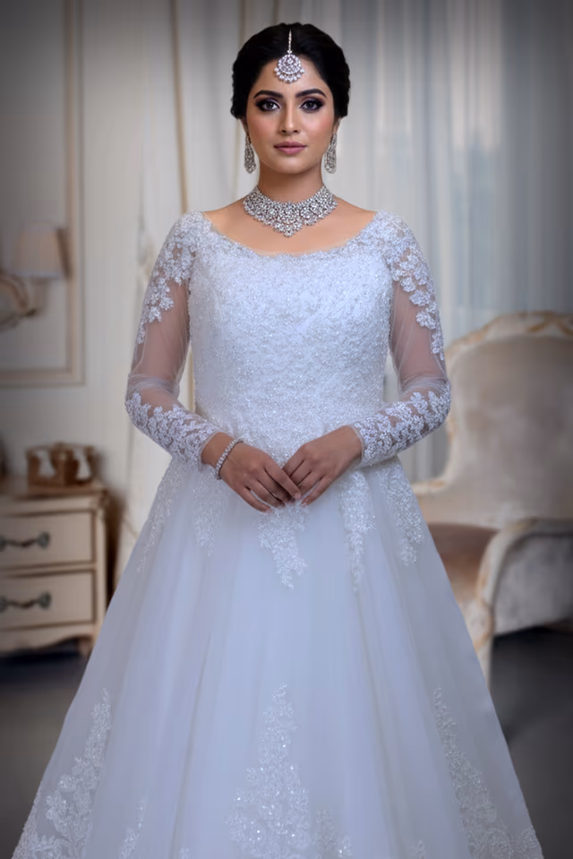 White Net Ball Gown with Floral Appliqué Embroidery — rent in Kochi