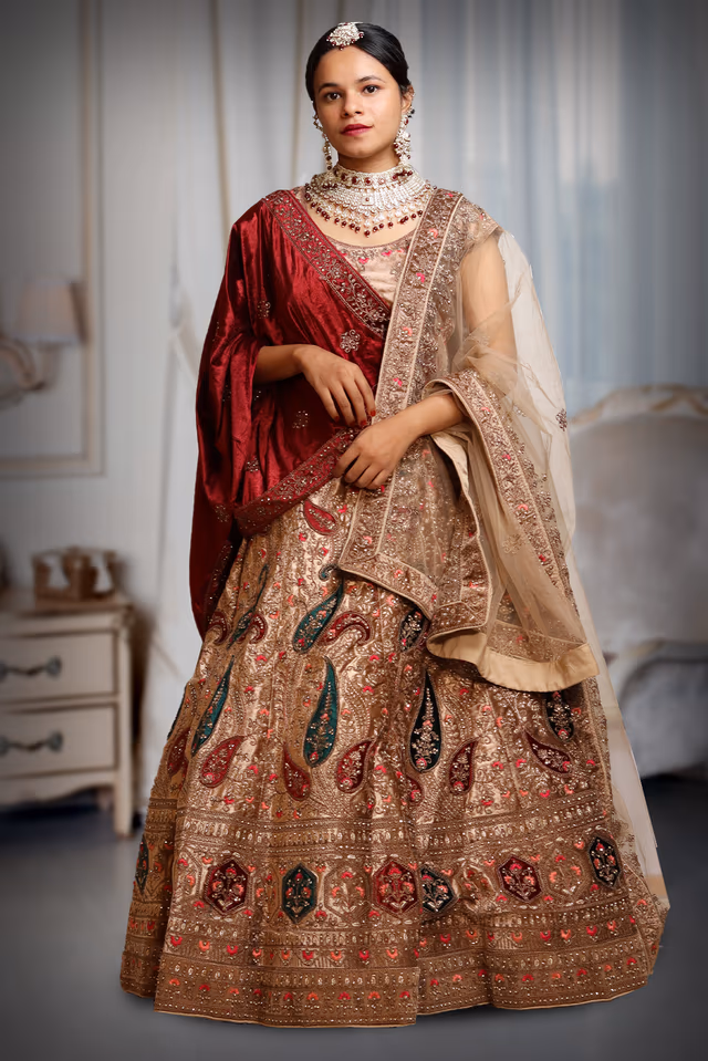 Beige Bridal Lehenga With Golden Threadwork Details And Maroon Color Dupatta — back view, rent in Calicut