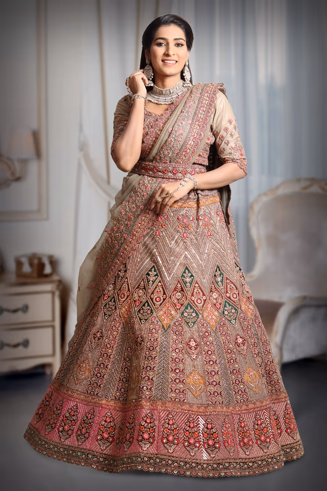 Chikku colour multicolour  heavy embroidery and sequins work lehenga — back view, rent in Bangalore
