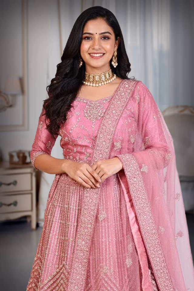 Dark Coral Pink Lehenga With Intricate Golden Handwork Details In Skirt And Top Along With Same Color… — rent in Calicut