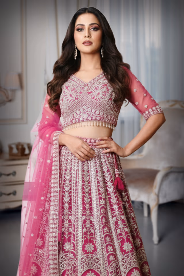 Elevate Your Wedding Look With This Dark Pink Ensemble And Heavy Embellishments — rent in Calicut