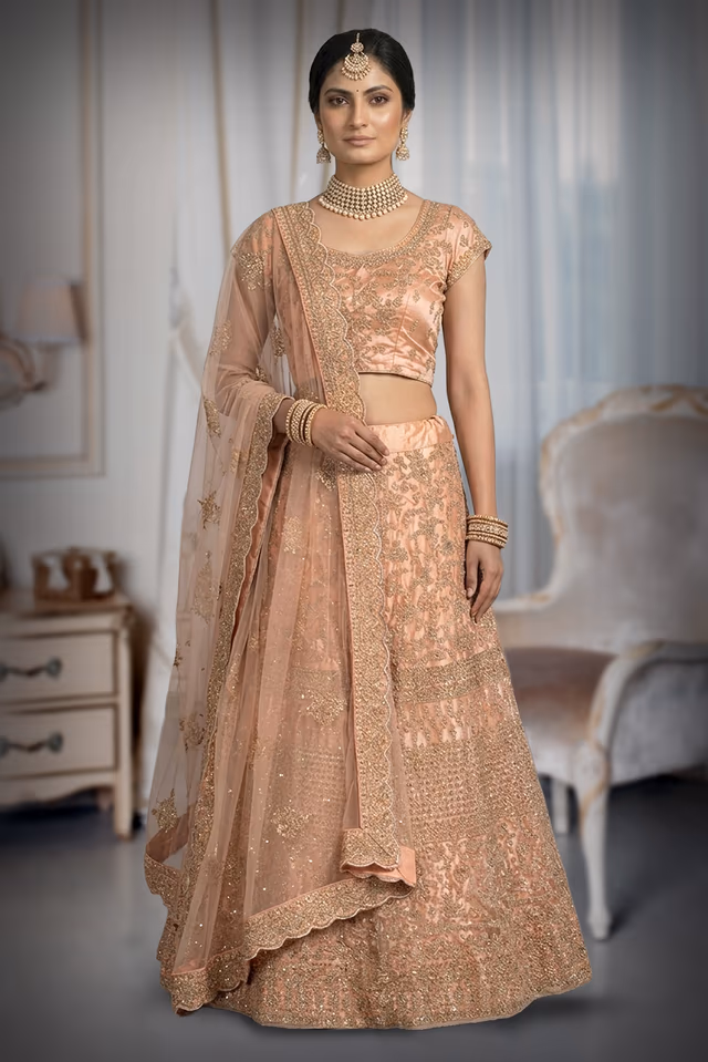 Gulnoor Peach Embroidered Zari Lehenga Set With Net Dupatta — back view, rent in Bangalore