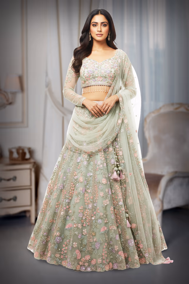 Heavy Hand worked Pastel Green Lehenga along with the dhuppatta and heavy Skirt — back view, rent in Coimbatore