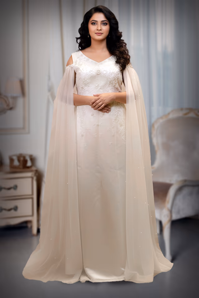 Ivory Embroidered Gown with Draped Net with water sleeve — back view, rent in Kochi