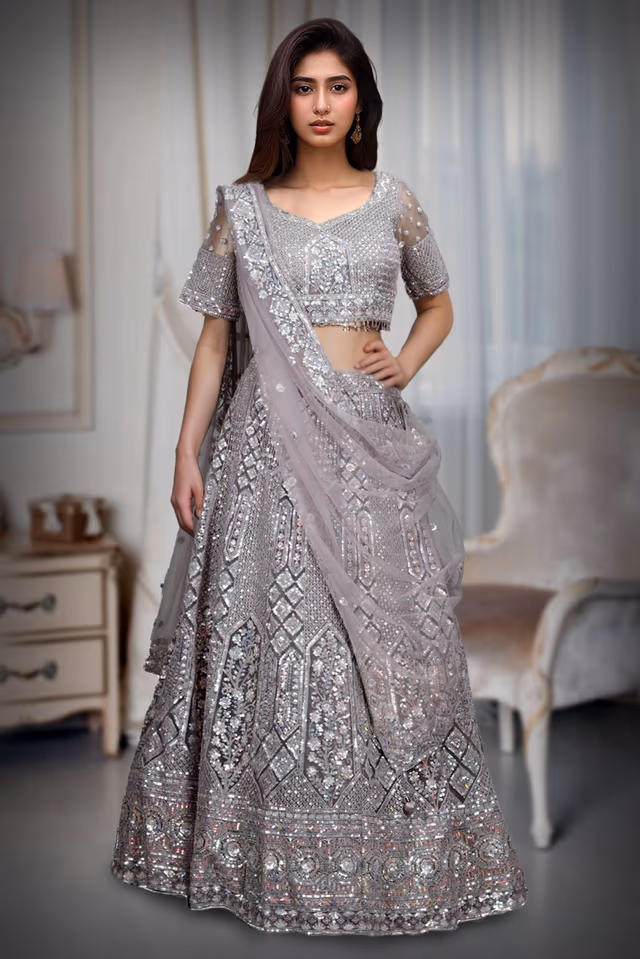 Lavender Net Lehenga With Exquisite Threadwork And Detailing Throughout The Lehenga — back view, rent in Kochi
