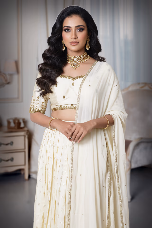 Elegant Off White Wedding Lehenga With Gold Embroidery And Plain Dupatta Suitable For Festive Functions — rent in Calicut