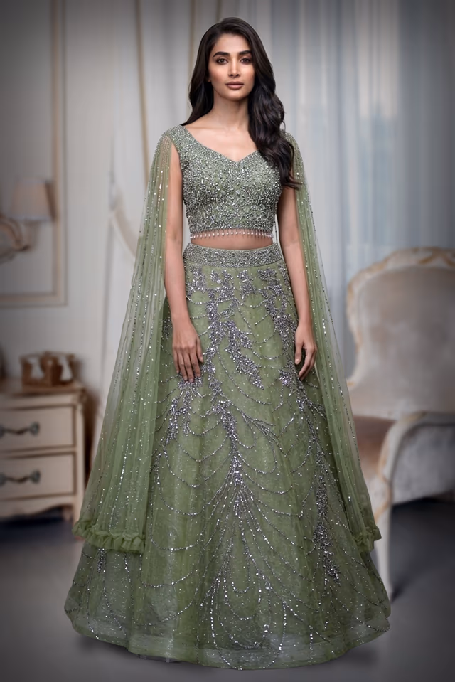 Olive Green Pre Wedding Lehenga With Net Extended Cape Sleeve — back view, rent in Bangalore