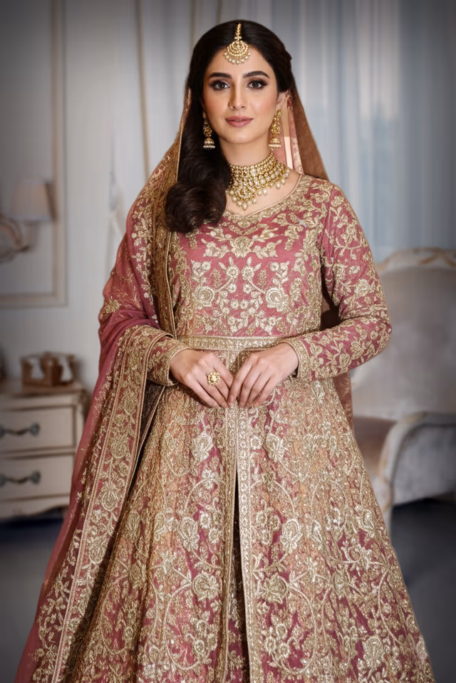 Elegant Onion Pink Arabic-Style Lehenga with Intricate Gold Embroidery, Skirt, and Dupatta — rent in Kochi