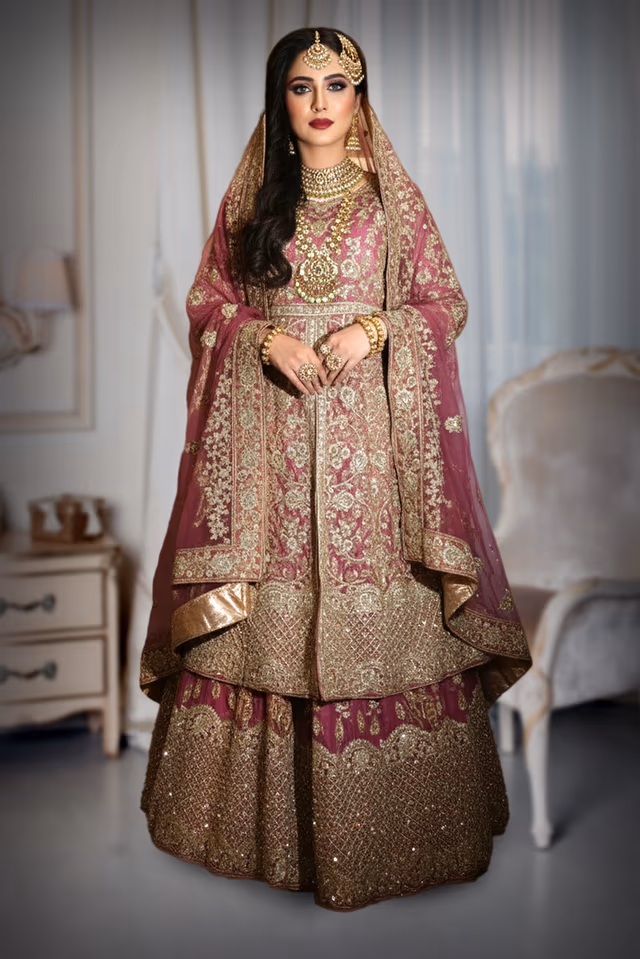 Elegant Onion Pink Arabic-Style Lehenga with Intricate Gold Embroidery, Skirt, and Dupatta — back view, rent in Kochi