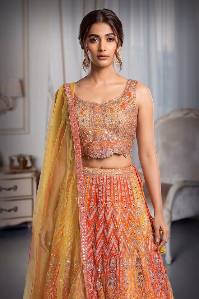Orange And Yellow Ombre Shaded Lehenga With Heavy Embelishment Of Threadworks — rent in Coimbatore