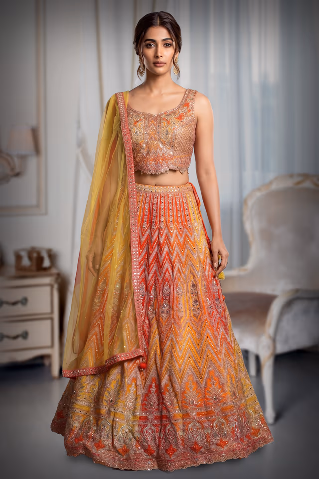 Orange And Yellow Ombre Shaded Lehenga With Heavy Embelishment Of Threadworks — back view, rent in Coimbatore