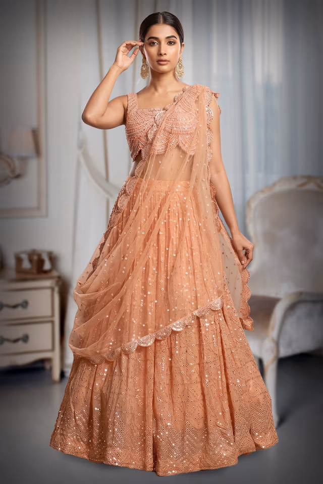 Pastel Peach Georgette  Heavy Worked Lehenga — back view, rent in Kochi
