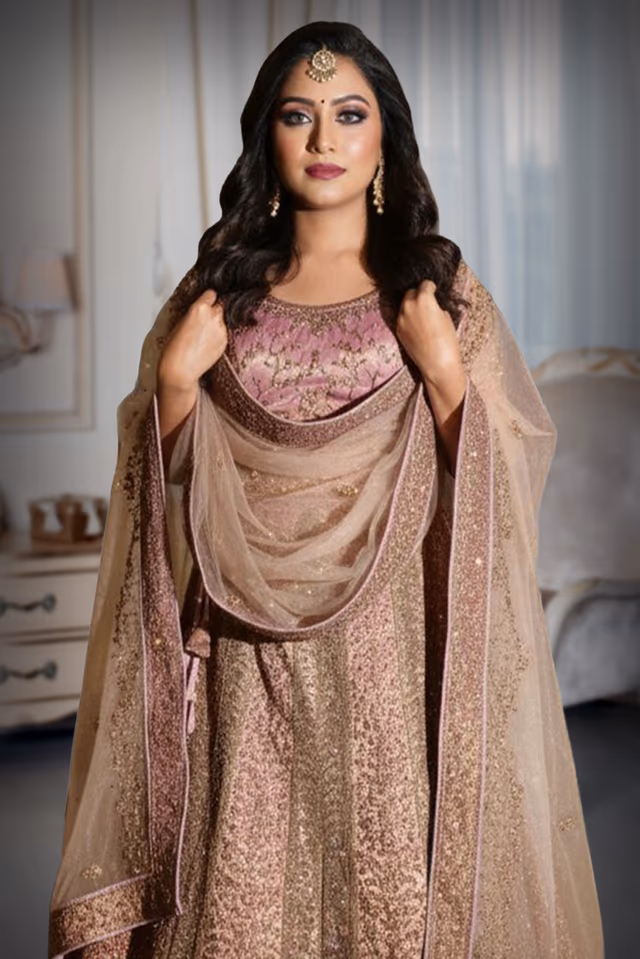 Elegant Pastel Pink lehenga, blazes with intricate embroidery and shimmering sequins — rent in Calicut