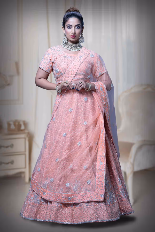 Peach Jaal Work Silk Lehenga — back view, rent in Calicut