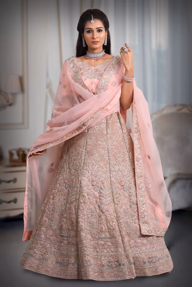 Peach  Jarkan stone net lehenga — back view, rent in Coimbatore