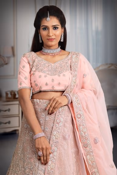 Peach  Jarkan stone net lehenga — rent in Coimbatore
