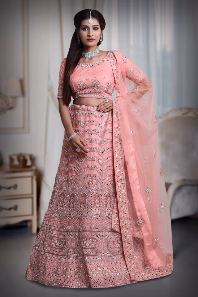 Peach pink embroidery work lehenga — back view, rent in Bangalore