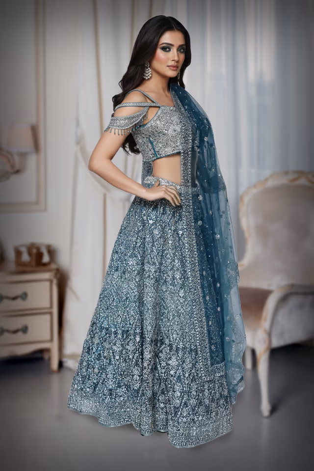 Peacock Blue Stone-Embellished Lehenga Set with Detailed Skirt Work and Cold-Shoulder Blouse — back view, rent in Bangalore