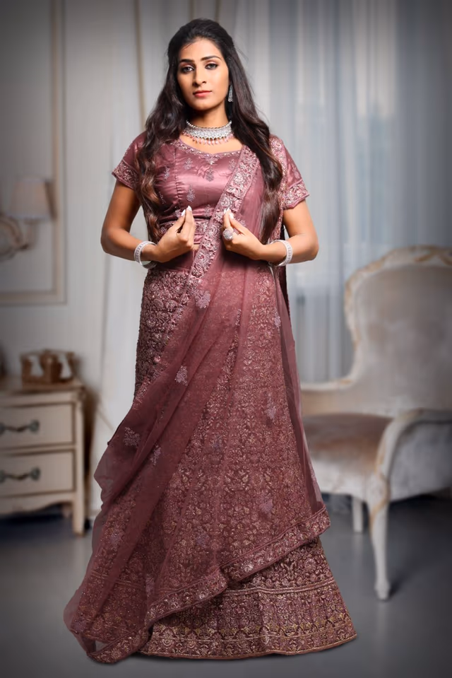 Heavy Threadwork Dark  Mauve Lehenga With Shimmery Work Minimal Blouse And Same Color Dupatta — back view, rent in Calicut