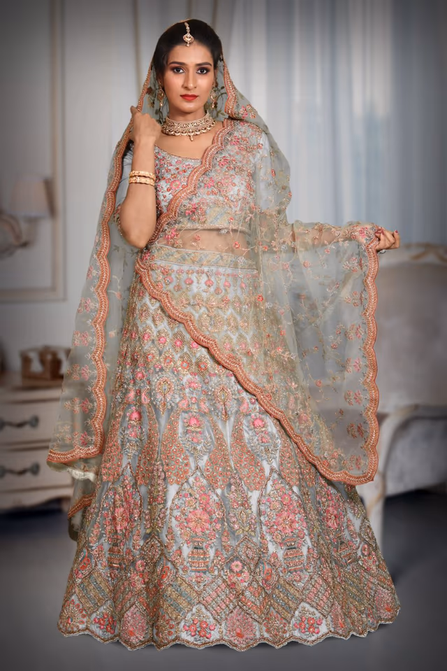 Turquoise blue sequins embroidery work net lehenga — back view, rent in Calicut