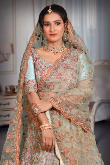 Turquoise blue sequins embroidery work net lehenga — rent in Calicut