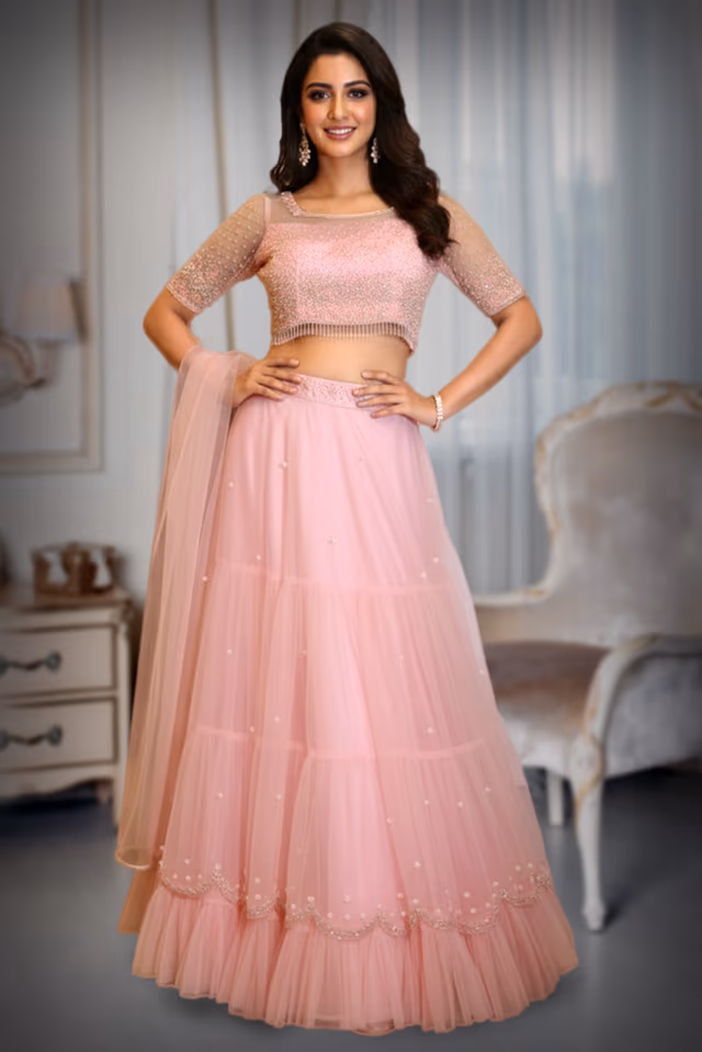 Baby Pink Layered Net Lehenga with Pearl and Sequins Embellishments — back view, rent in Kochi