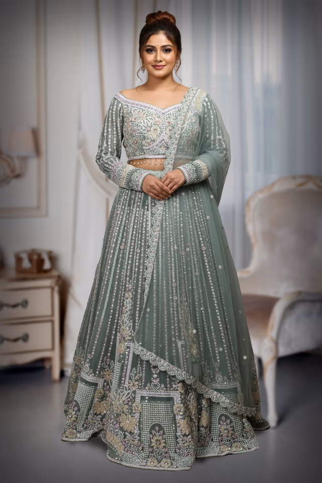 Luxurious Sea Grey Ensemble Presents A Resplendent Design, Combining Traditional Aesthetics… — back view, rent in Calicut